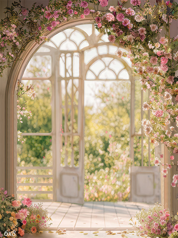 Spring floral garden solarium backdrop featuring blooming flowers and open arched windows for photography sessions.