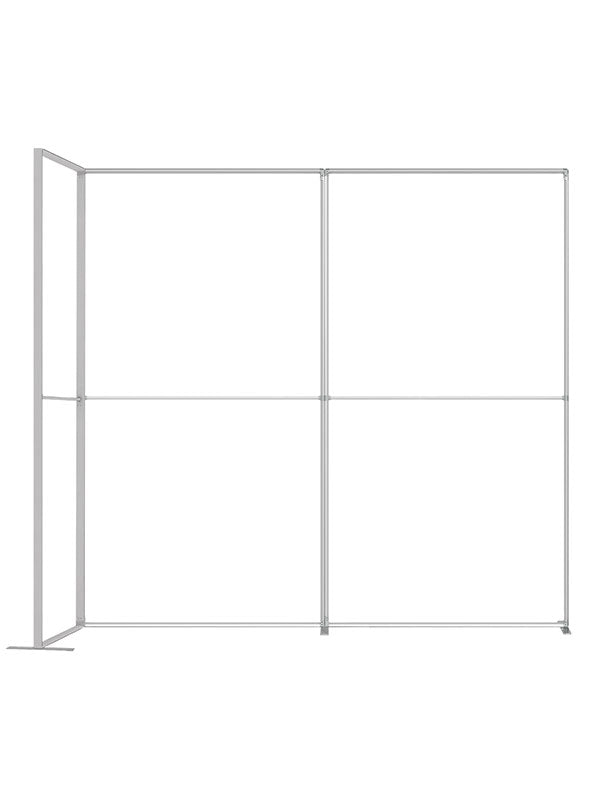 An expanded 4 ft frame configuration with two connected walls forming an open corner that extends into a side return, viewed from a three-quarter angle, in lightweight silver aluminum — part of the Denny StudioEdge modular backdrop frame system.