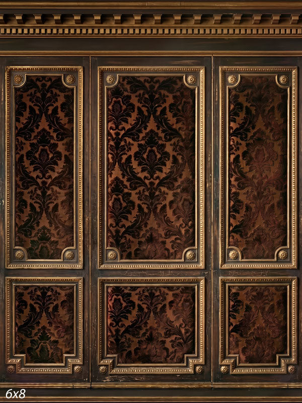 Dark walnut paneled wall with gold-beaded frames and deep brown damask brocade panels, an old-world formal photography backdrop.