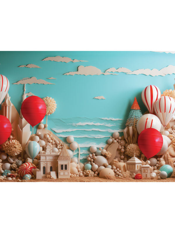 Beach Bliss Cake Smash Backdrop - Whimsical beach-themed cake smash backdrop with red and white balloons, sandcastles, beach balls, and a sky blue background with clouds.