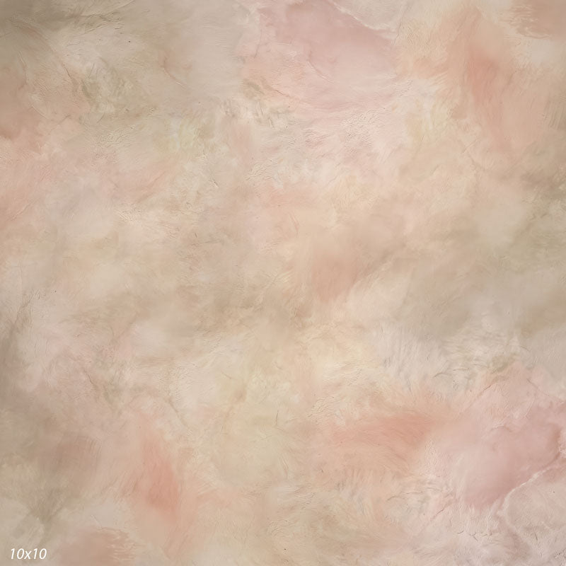 Printed studio background showing a painterly mottled blush cream texture with a lighter center that deepens toward the edges.