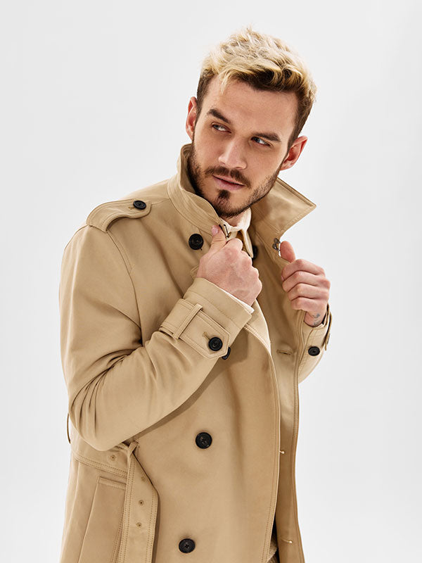 A model posing against a bright white seamless backdrop, ideal for professional studio photography and editorial fashion shoots.
