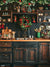 Christmas Kitchen Photography Backdrop - Charming Christmas kitchen backdrop with a decorated wreath, festive garlands, and holiday-themed decorations on rustic wooden cabinets and countertops.