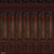 Classic wood-paneled backdrop with deep mahogany tones, intricate carvings, and geometric paneling, ideal for refined photography settings and historical themes.
