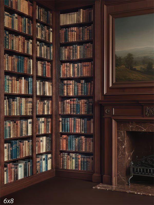 Printed photography backdrop showing a classic library corner with tall bookshelves filled with books and a fireplace beneath framed wall art. The interior scene provides structured lines behind a subject.
