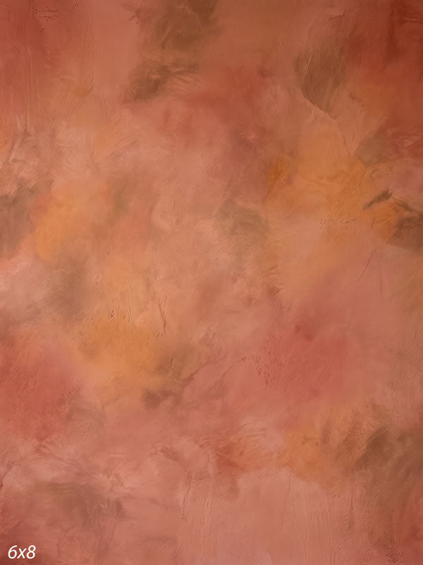Printed photography backdrop showing warm terracotta and dusty rose clay, a soft mottled painterly texture with gentle tonal movement.