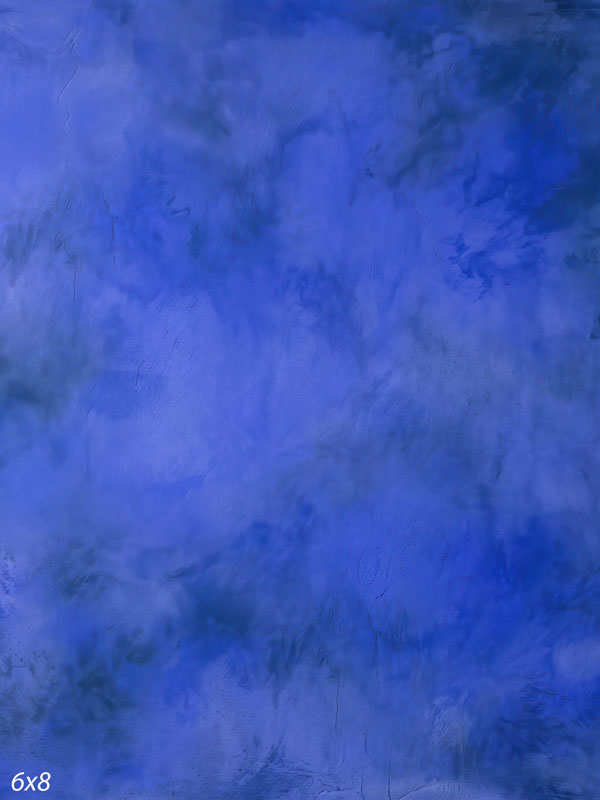 Printed photography backdrop showing richly saturated cobalt blue, a soft mottled painterly texture with gentle tonal movement.