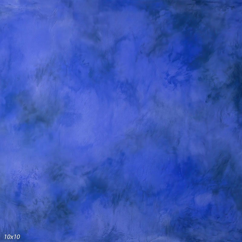 Printed studio background showing a painterly mottled cobalt blue texture with a lighter center that deepens toward the edges.