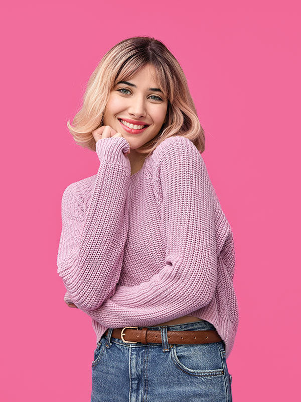 A lifestyle photography session using a deep pink seamless backdrop, ideal for branding and content creation.