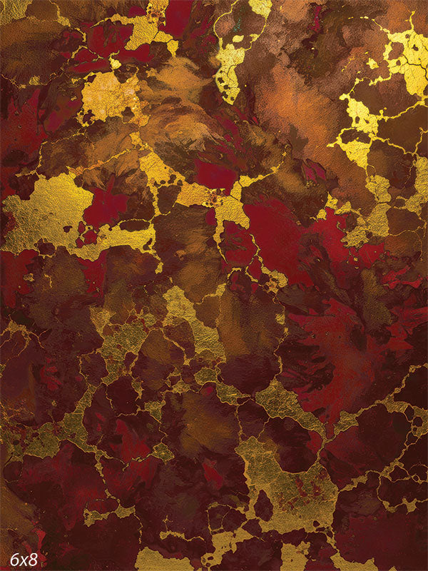 Printed photography backdrop showing an abstract marbled surface with deep red and warm brown tones and gold metallic-style veining throughout. The high-contrast texture creates a dramatic studio background behind a subject.