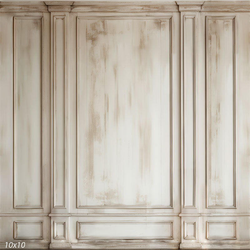 Photography backdrop featuring an elegantly distressed ivory wall with classic paneling and soft weathered textures.