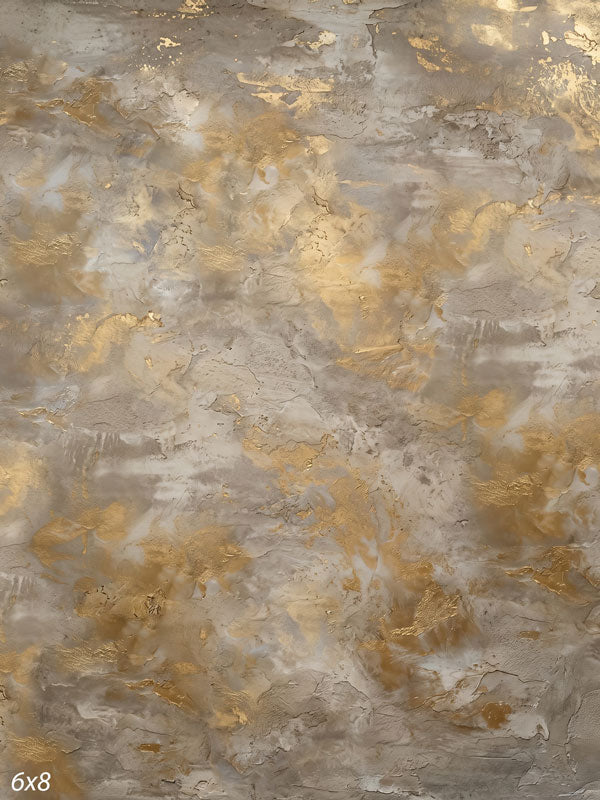 Printed photography backdrop showing driftwood taupe-gray with scattered gold flecks, a soft mottled painterly texture with gentle tonal movement.