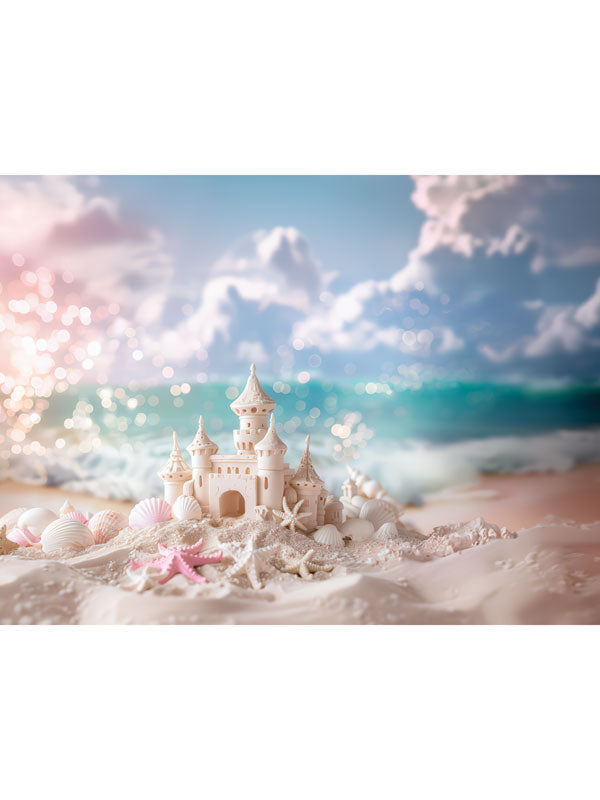 Enchanted Sandcastle Beach Photography Backdrop - Photography backdrop featuring a sandcastle, seashells, and starfish on a beach with soft ocean waves in the background.