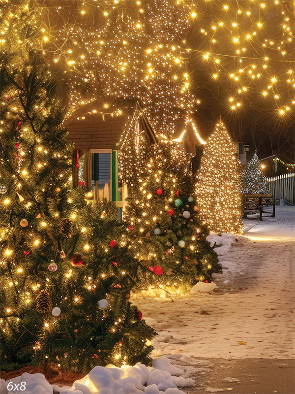 Enchanted Winter Night Christmas Photography Backdrop - Magical winter night scene with snow-covered Christmas trees adorned with ornaments and glowing fairy lights, a street illuminated with warm, golden lights, and quaint wooden houses decorated for the holidays.