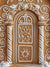 Festive Gingerbread House Door Christmas Backdrop - Festive gingerbread house door backdrop featuring a detailed door with white icing decorations, candy cane pillars, and intricate patterns, creating a cozy and whimsical holiday atmosphere.