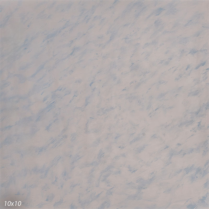 Light, airy hand-painted photography backdrop with pale powder-blue drifting across a bright off-white ground for high-key studio portraits.
