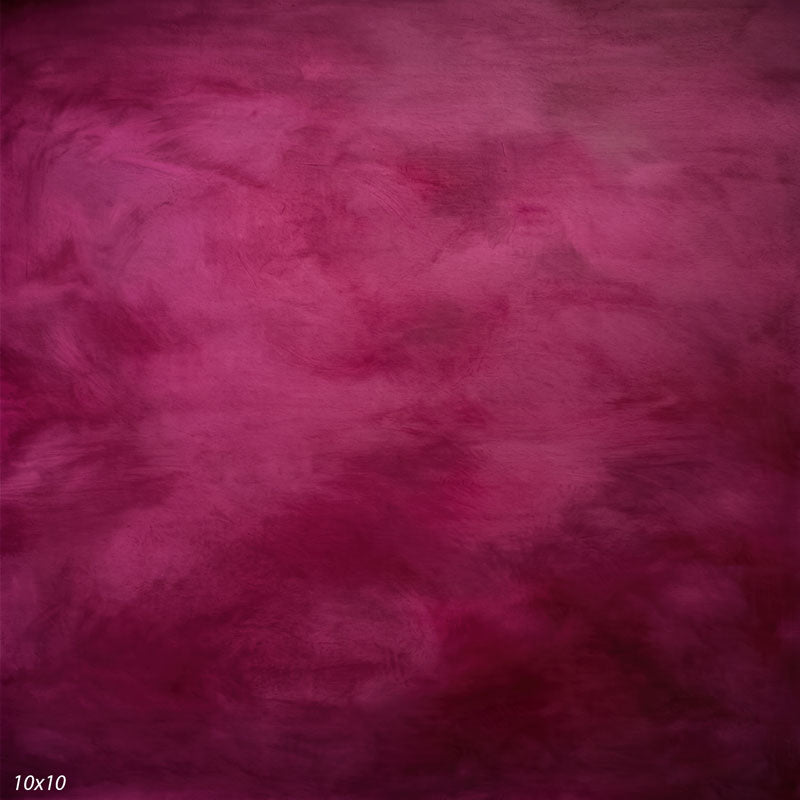 Printed studio background showing a painterly mottled fuchsia texture with a lighter center that deepens toward the edges.