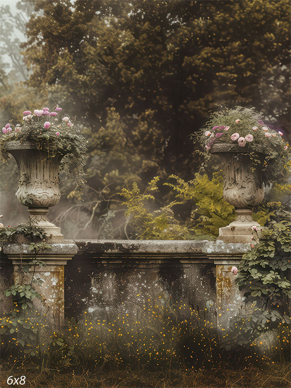 Rustic garden wall photography backdrop with stone urns, delicate pink flowers, and lush greenery for professional photography use.