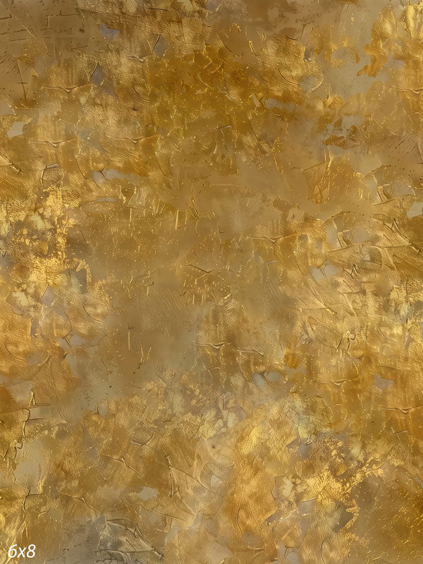 Printed photography backdrop showing golden ochre with metallic gold-leaf flecks, a soft mottled painterly texture with gentle tonal movement.