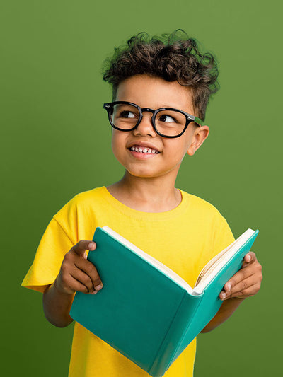 A green screen seamless backdrop in a controlled studio environment, used for product and commercial photography.