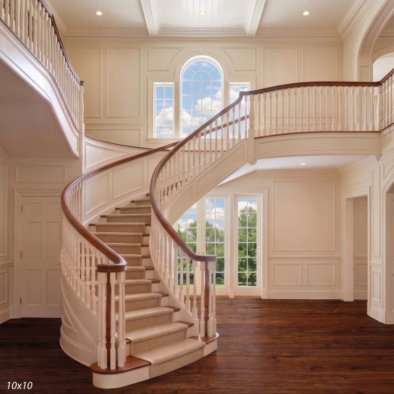 Wider view of the two-story foyer showing the full upstairs balcony, an arched Palladian window and more of the open hardwood floor, a traditional interior photography backdrop.