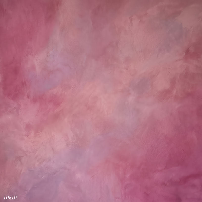 Printed studio background showing a painterly mottled faded rose texture with a lighter center that deepens toward the edges.