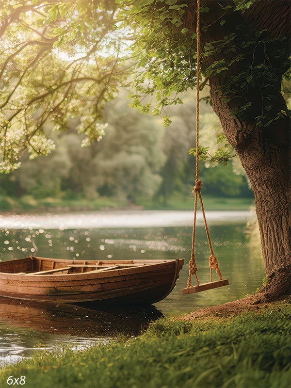 Lakeside Swing and Boat Photography Backdrop - Rustic wooden boat on a lakeshore with a swing hanging from a tree, ideal for nature-themed photography sessions.