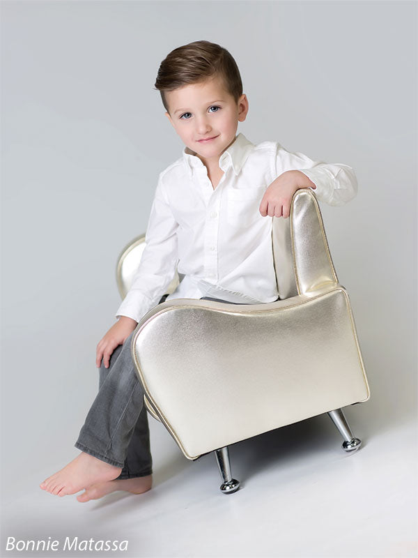 Classic light gray studio backdrop with gold chair—perfect for stylish school, family, and toddler portraits.
