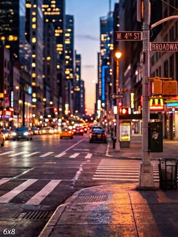 Wet downtown street corner at dusk with a signal post, crosswalk and neon storefronts receding to a glowing horizon, a city street photography backdrop.