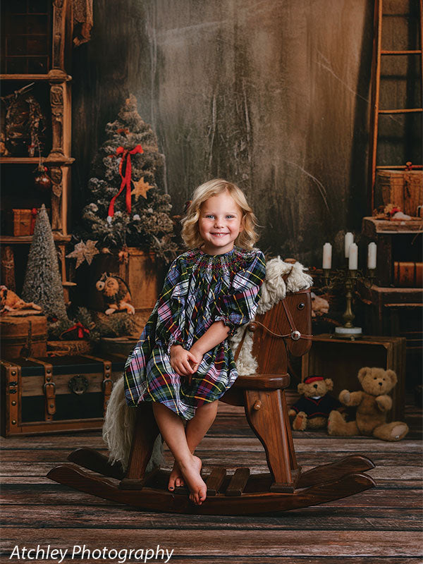Nostalgic Christmas toy shop backdrop with handcrafted wooden toys, twinkling lights, and a cozy, festive atmosphere.