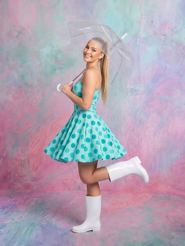 Opal Dream iridescent pastel texture photography backdrop shown behind a woman holding a clear umbrella CP-9004