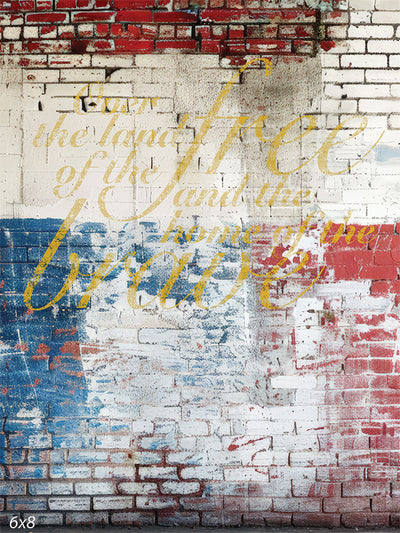 Worn American flag brick wall backdrop with vintage texture and patriotic script, perfect for professional photoshoots and creative photography.