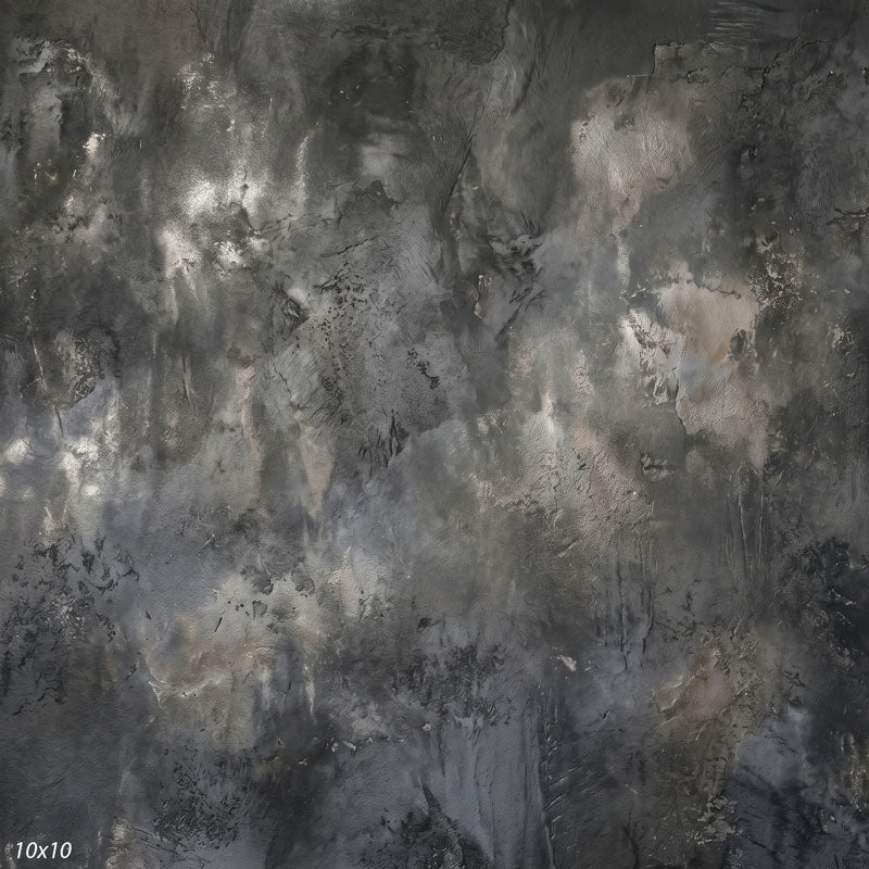 Printed studio background showing a painterly mottled gunmetal gray texture with a lighter center that deepens toward the edges.