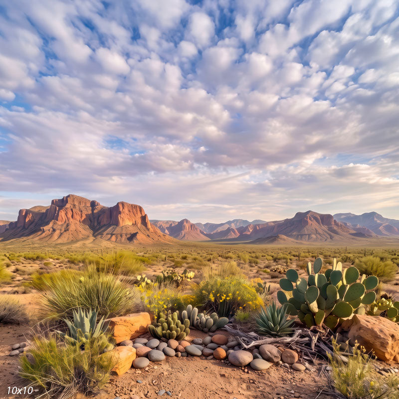 Desert photography backdrop shown wider, with more sky, layered red rock mountains, and a broad basin of cacti and desert scrub.
