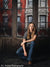 Gritty studio backdrop with loft windows and red brick—ideal for senior portraits or school photographer use.