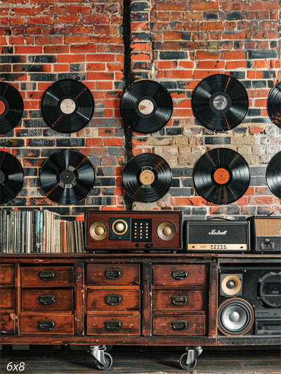 Retro Vinyl Record Wall Photography Backdrop - Vintage brick wall with mounted vinyl records and rustic audio equipment, ideal for music-themed photography and retro-inspired shoots.