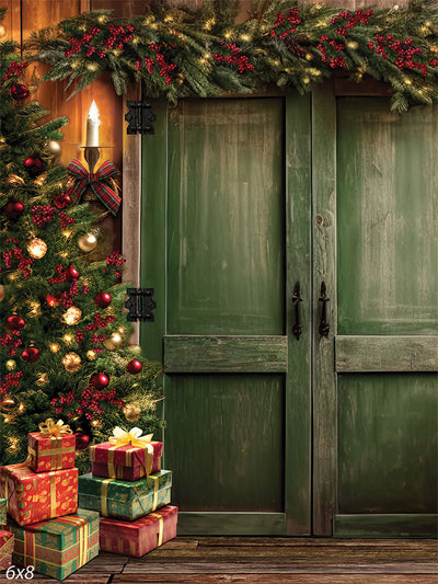 Rustic Christmas Barn Door Photography Backdrop - Rustic Christmas scene with a decorated tree, green barn door, garlands, and presents, ideal for holiday photography.