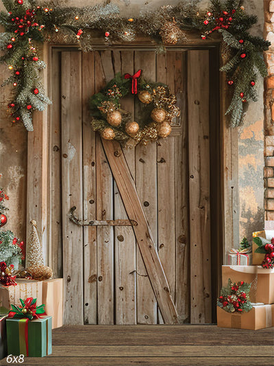 Rustic Christmas Door Backdrop - Rustic wooden door decorated with a festive wreath, lush evergreen garlands with red berries and warm lights, and neatly stacked Christmas presents, creating a cozy holiday ambiance.