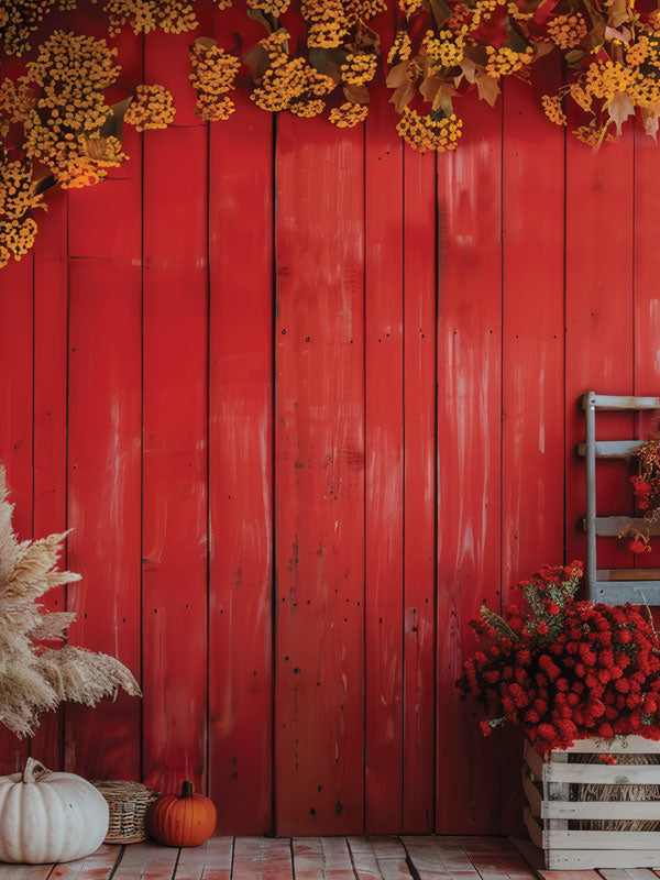 Rustic Red Barn Fall Photography Backdrop - Photography backdrop featuring a rustic red barn wall with autumn decorations including foliage and pumpkins.