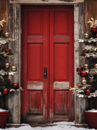 Rustic Red Door Christmas Photography Backdrop - Rustic red door with snow-covered trees and festive ornaments, perfect for Christmas photography.