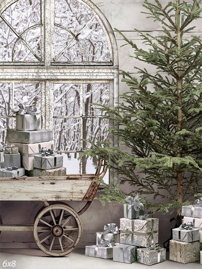 Rustic Winter Wonderland Photography Backdrop - Rustic winter scene with a vintage cart of gifts, frosted window, and snow-covered evergreen tree, perfect for holiday photography.