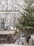 Rustic Winter Wonderland Photography Backdrop - Rustic winter scene with a vintage cart of gifts, frosted window, and snow-covered evergreen tree, perfect for holiday photography.