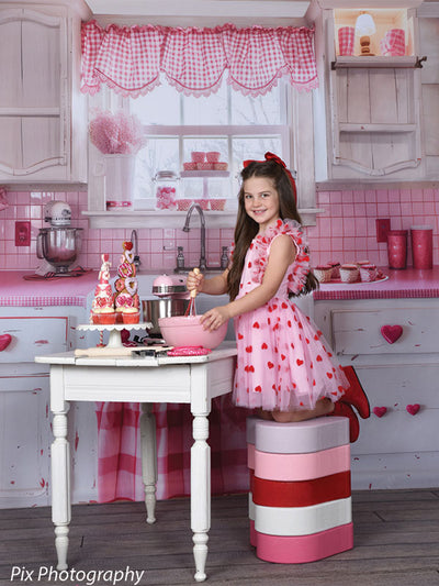Realistic weathered wood floor backdrop grounds a Valentine kitchen photo scene with heart-themed styling.