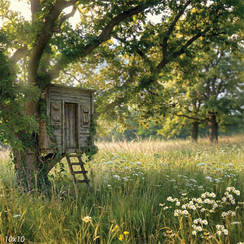 This studio background features a rustic treehouse set into a large tree with an open wildflower meadow and layered greenery extending across the scene.