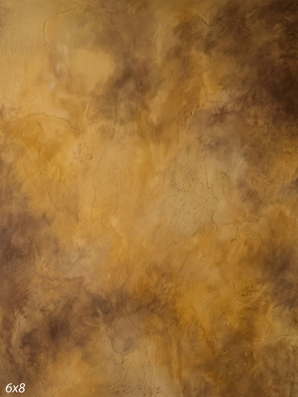 Printed photography backdrop showing warm honey amber and ochre, a soft mottled painterly texture with gentle tonal movement.