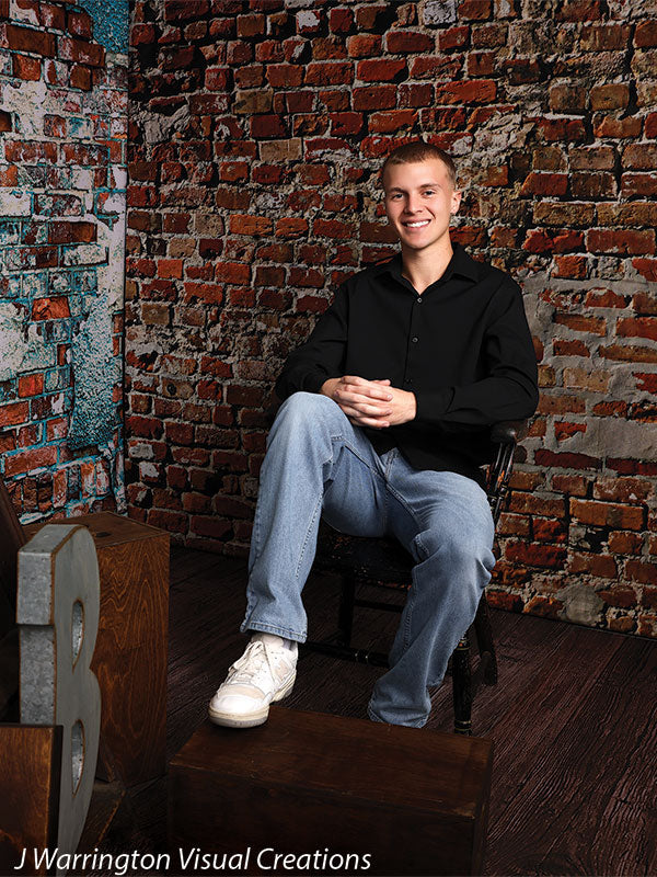 Southwestern rustic brick studio backdrop with natural aging.