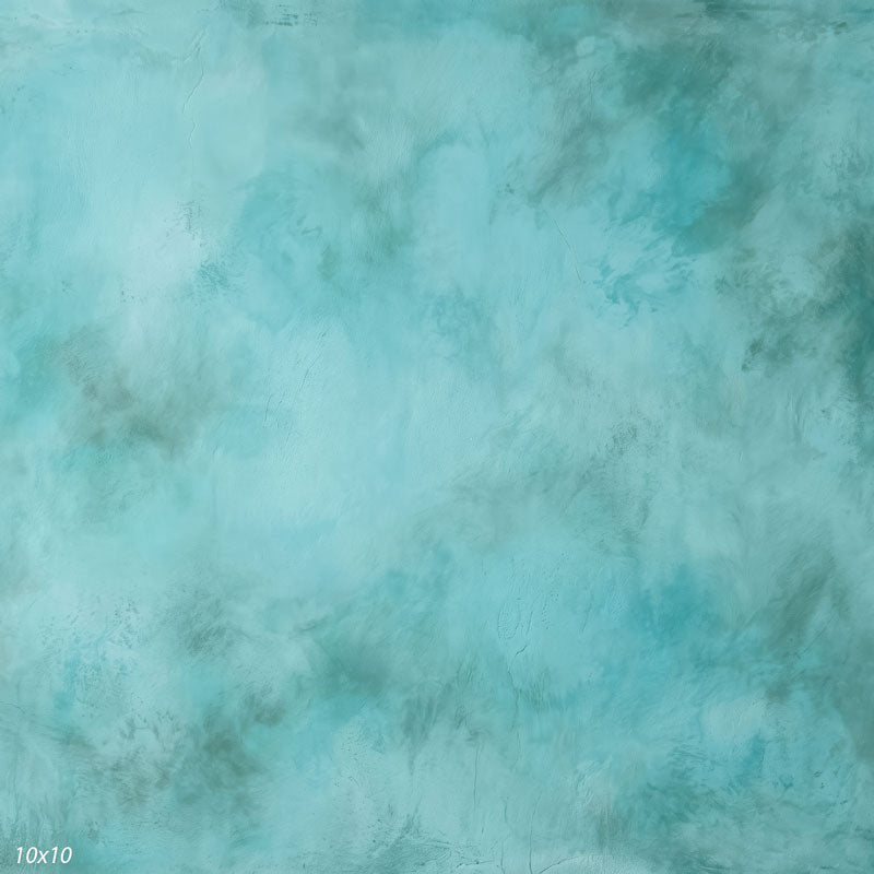 Printed studio background showing a painterly mottled seafoam aqua texture with a lighter center that deepens toward the edges.