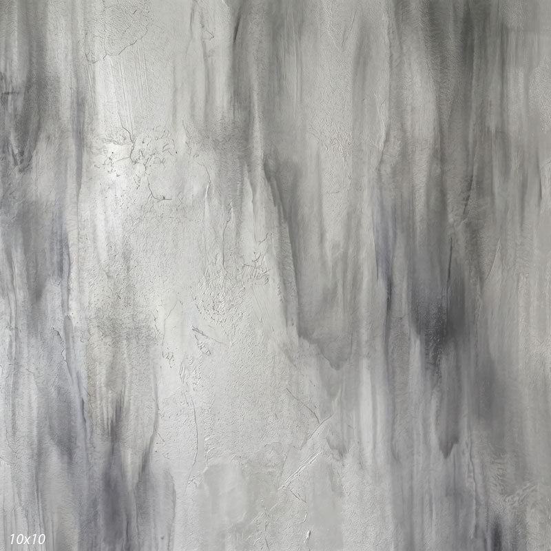 Printed studio background showing a painterly mottled silver gray texture with a lighter center that deepens toward the edges.