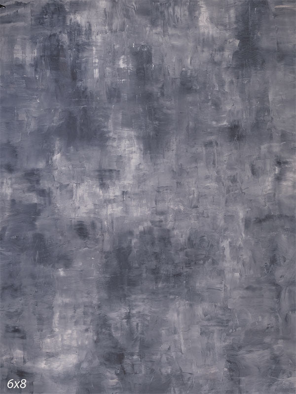 Cool blue-grey hand-painted photography backdrop with an even mottled painterly finish for neutral studio portraits.