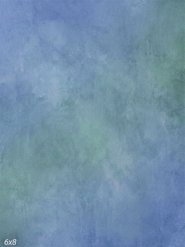 Soft pastel painted-style photography backdrop with blended blue and green tones for studio portraits.